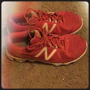 Pink,white,and green new balance shoes